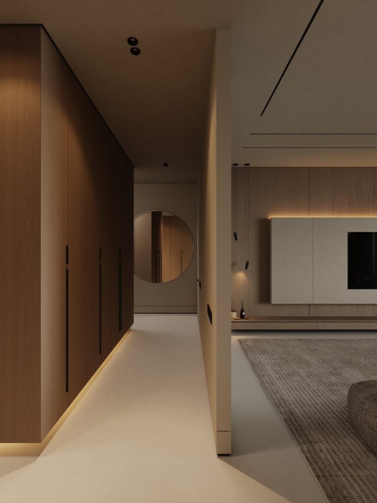 Modern living room and hallway with beige walls, wood panels, and grey rug.